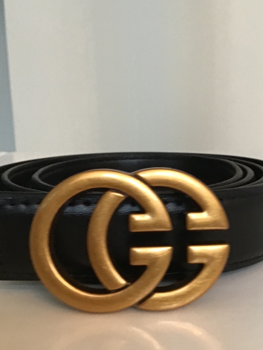 Black faux leather GG logo buckle belt